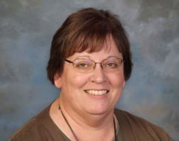 Headshot of Shari Kuther.