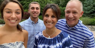 Cheryll Plunkett, middle, with her daughter, son, and husband.