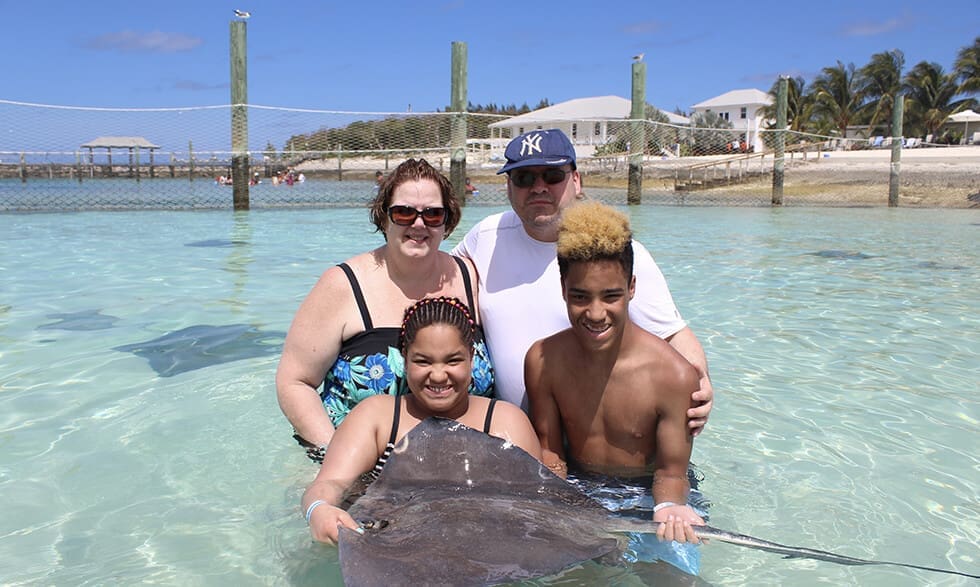 The Lanzara family on vacation. Clockwise from upper left: Mary, Darryl, Merita, and Luis.