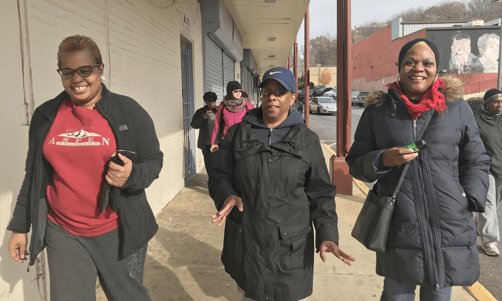 D.C. resident Deborah Nix, left, helps lead a walking program with NIH.