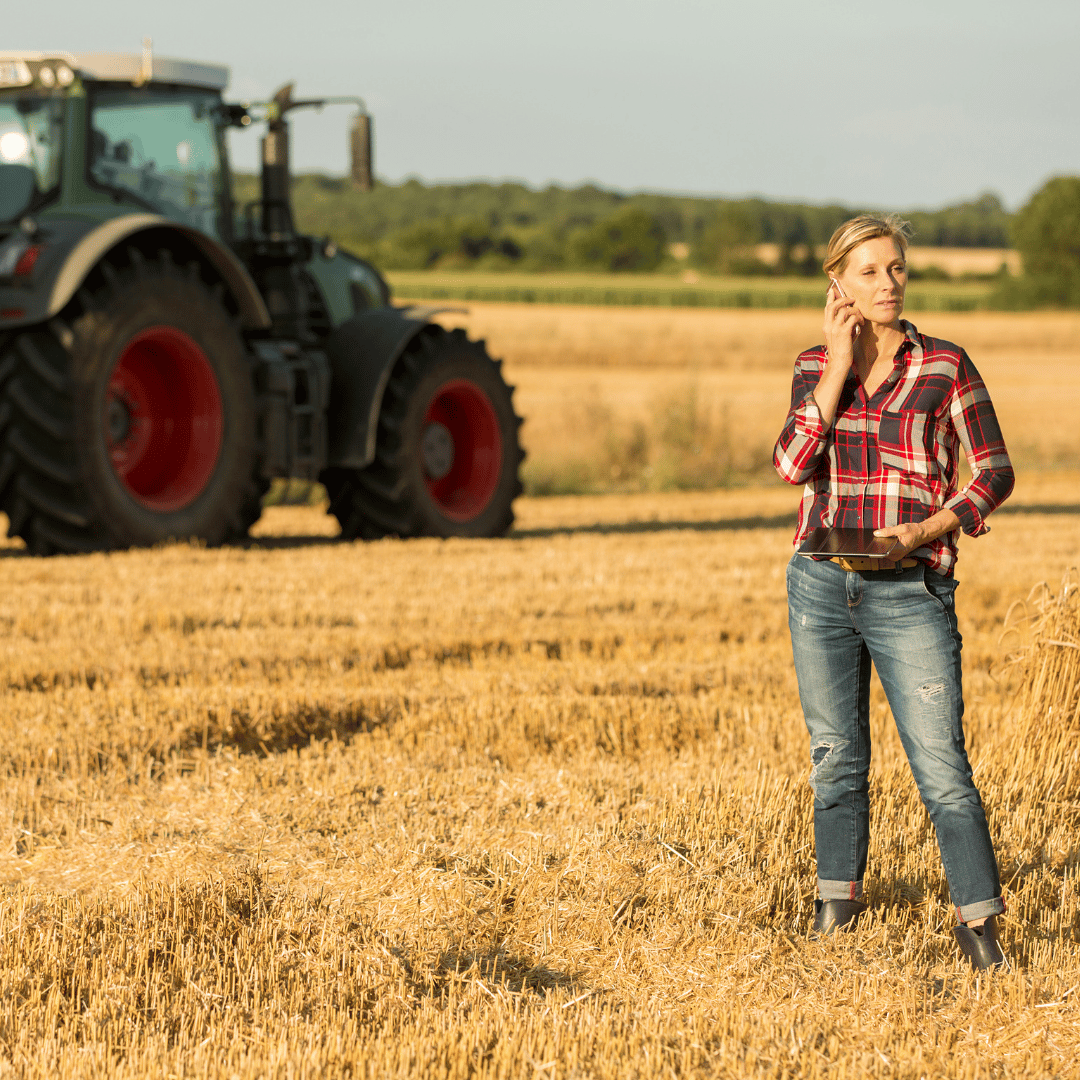 Female farmer in empty field