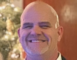 Headshot of Greg Baker.